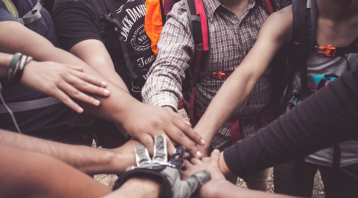 community hands in